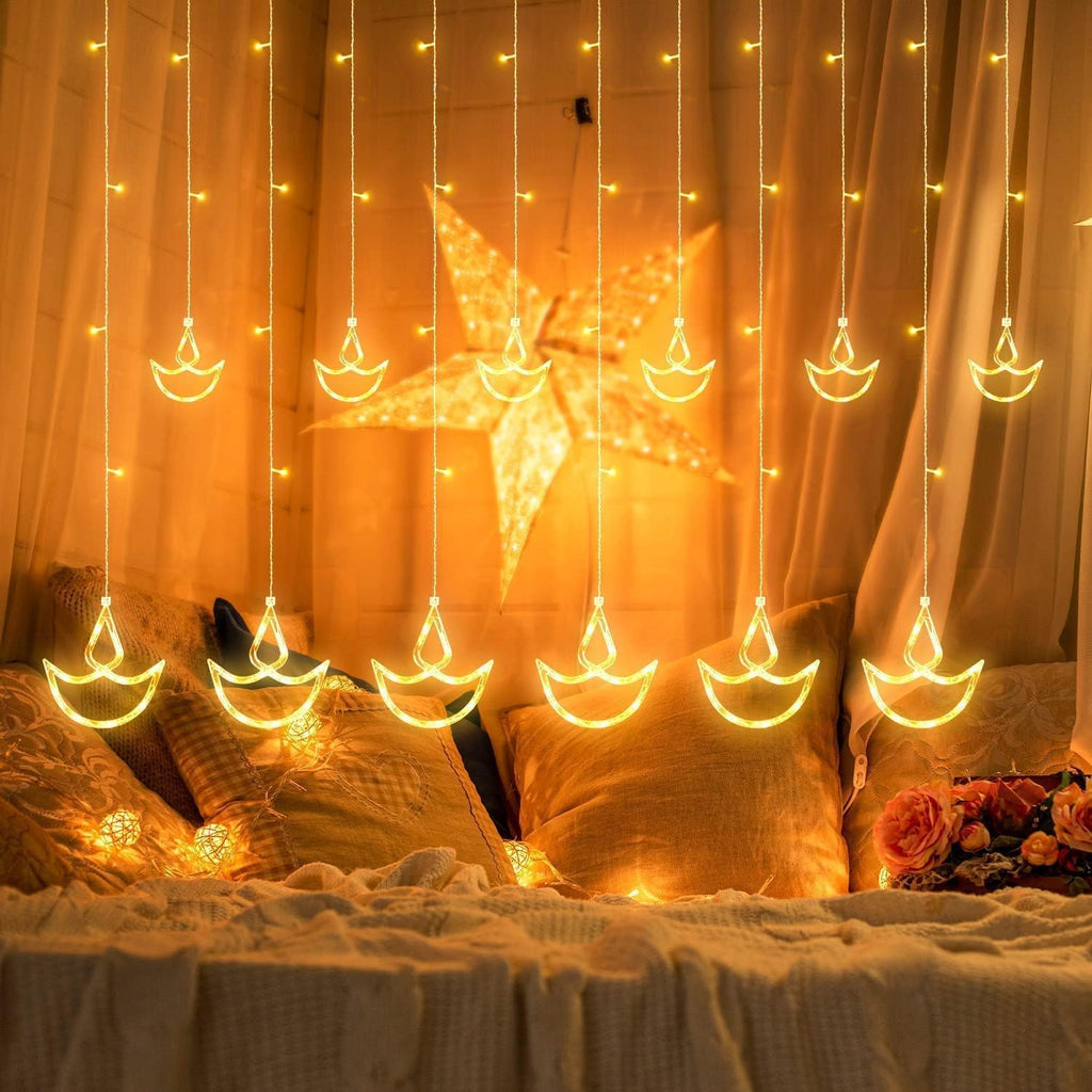LIVIQUE 12 Diya Diwali Curtain String LED Lights for Decoration, Window Lights with 8 Flashing Modes, Home Decoration for Diwali, Wedding, Party, Christmas, Balcony - Warm White (12 Diya)